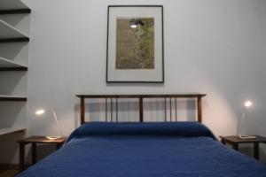 A bed or beds in a room at Celia House