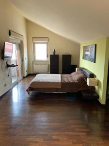 Ένα ή περισσότερα κρεβάτια σε δωμάτιο στο Il bouganville +10 φωτογραφίες