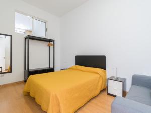 A bed or beds in a room at Celia House