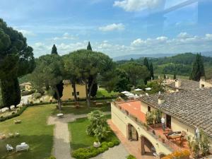 an aerial view of a house with a garden at Tenuta Di Sticciano in Certaldo