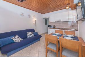 Kuchyň nebo kuchyňský kout v ubytování Apartments Josip