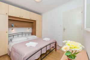 Postel nebo postele na pokoji v ubytování Apartments Josip