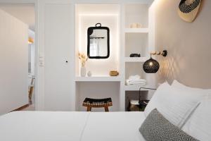 Posteľ alebo postele v izbe v ubytovaní Nexus Downtown Apartment