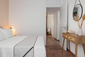 Posteľ alebo postele v izbe v ubytovaní Nexus Downtown Apartment