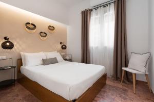 Posteľ alebo postele v izbe v ubytovaní Nexus Downtown Apartment
