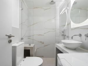 Kúpeľňa v ubytovaní Nexus Downtown Apartment