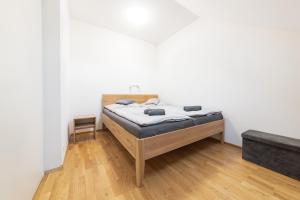 Posteľ alebo postele v izbe v ubytovaní Deštné apartmány