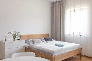 Postel nebo postele na pokoji v ubytování Deštné apartmány