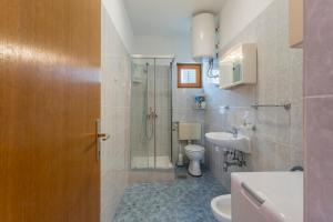 Kúpeľňa v ubytovaní Apartmani Prkačin