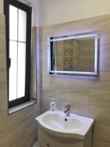 Et badeværelse på Pensiunea ARMONIA + 75 billeder