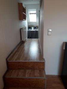 Kuchyň nebo kuchyňský kout v ubytování Podkrovní apartmán