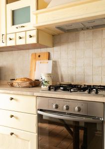 Dapur atau dapur kecil di Noi2+2 Vacanze - App. ANDREA