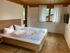 Posteľ alebo postele v izbe v ubytovaní Haus Emma