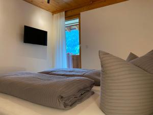 Posteľ alebo postele v izbe v ubytovaní Haus Emma