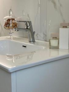 a bathroom sink with a faucet on a counter at Campitur in Campomarino +68 photos