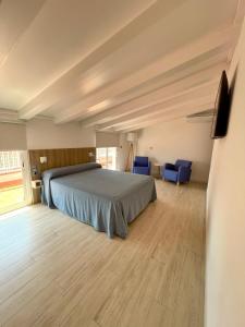 Postel nebo postele na pokoji v ubytování Hotel Nereida + 37 fotografií