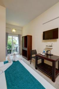 Voodi või voodid majutusasutuse Kurinji Wanderlust Resort Munnar toas