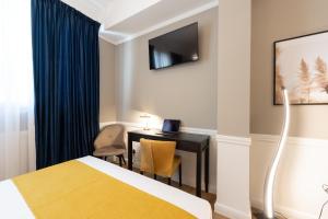 TV a/nebo společenská místnost v ubytování Pure Hotel by Athens Prime Hotels