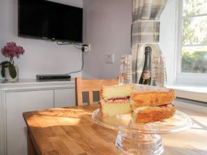 a piece of cake sitting on a table at Parva in Middlesbrough