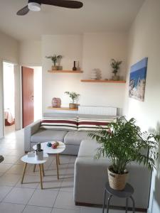 A seating area at Casa Plumeria at Gouves Beach