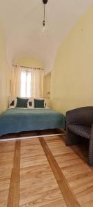 Cama ou camas em um quarto em ReHouse Stikliu 4
