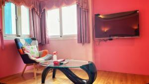 Μια τηλεόραση ή/και κέντρο ψυχαγωγίας στο Wonderful Kenting Hostel