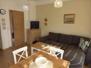 TV/trung tâm giải trí tại вила ФЛОРА