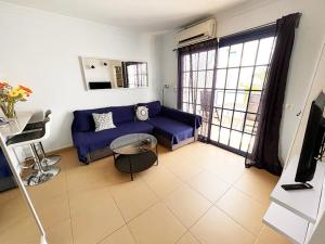 A television and/or entertainment centre at NEW Atalaya - Amazing Sea Views&Fantastic Pool