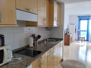 Kuchyňa alebo kuchynka v ubytovaní Casa Vacanza in Oasis Tamarindo