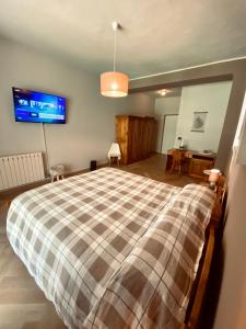 Posteľ alebo postele v izbe v ubytovaní HOTEL LE FONTI