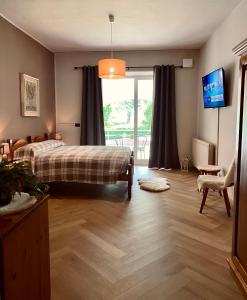 Posteľ alebo postele v izbe v ubytovaní HOTEL LE FONTI