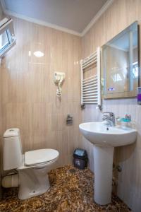 Koupelna v ubytování HOTEl MKUDRO