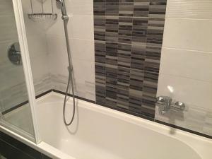 A bathroom at Family Wellness Apartman