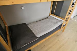 Tempat tidur dalam kamar di Nouveau studio avec vue imprenable sur la vallée