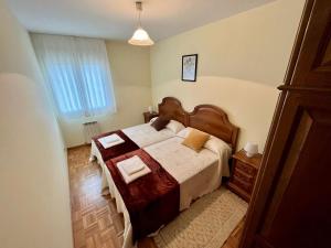 Posteľ alebo postele v izbe v ubytovaní Apartamento en A Pontenova