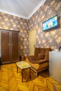 TV a/nebo společenská místnost v ubytování HOTEl MKUDRO