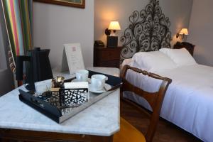 Postel nebo postele na pokoji v ubytování Albergo Ristorante Il Verbano
