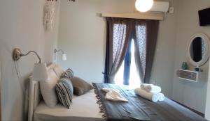 Postel nebo postele na pokoji v ubytování Allegria Family Hotel