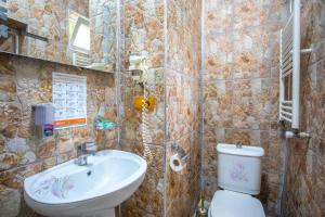 Koupelna v ubytování HOTEl MKUDRO