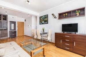 Telewizja i/lub zestaw kina domowego w obiekcie Apartamenty Casa Marina