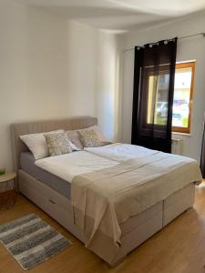 Posteľ alebo postele v izbe v ubytovaní Apartment Eli - Zadar