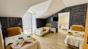 Postel nebo postele na pokoji v ubytování Nature Hotel Doğa Hotel Ölüdeniz + 37 fotografií