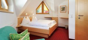 Postel nebo postele na pokoji v ubytování Hotel Kristall B&B