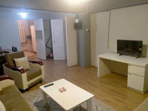 A television and/or entertainment centre at 2 bedrooms central area located appartment 1floor