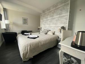 Posteľ alebo postele v izbe v ubytovaní Relais Les Loges-Etretat