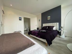 Posteľ alebo postele v izbe v ubytovaní Relais Les Loges-Etretat