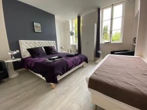 Posteľ alebo postele v izbe v ubytovaní Relais Les Loges-Etretat