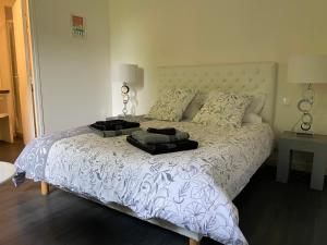 Posteľ alebo postele v izbe v ubytovaní Relais Les Loges-Etretat