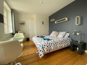 Posteľ alebo postele v izbe v ubytovaní Relais Les Loges-Etretat