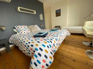 Posteľ alebo postele v izbe v ubytovaní Relais Les Loges-Etretat